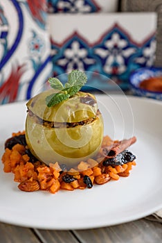 Turkish Lamb Meat and Rice Stuffed Apples Garnished with Spiced Vegetables, Dried Fruit and Nuts, Etli Elma Dolmasi