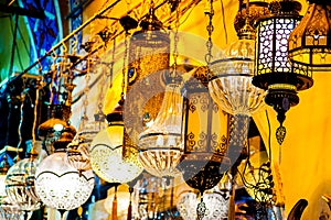 Turkish lanterns, old style lamps sold at Grand Bazar, craftsmanshift, colorfull lamps displayd at sunset