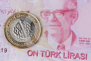 Turkish Lira banknotes with one lira coin