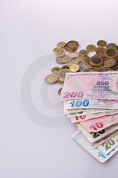 Turkish Lira coins and banknotes side by side