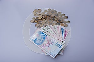 Turkish Lira coins and banknotes side by side