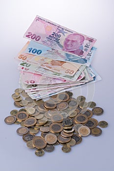 Turkish Lira coins and banknotes side by side