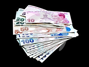 Turkish lira money Heap of banknotes over black background