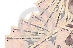 5 Turkish liras bills lies in different order isolated on white. Local banking or money making concept photo