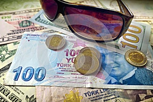 Turkish liras and sunglasses