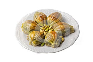 Turkish Midye Baklava ( Mussel Shape Baklava ) with green pistachio Powder and Butter Cream.