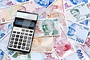 Turkish money Lira Banknotes with a calculator