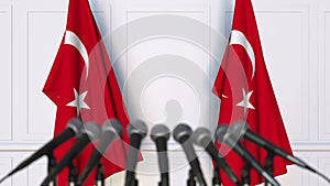 Turkish official press conference. Flags of Turkey and microphones. Conceptual animation