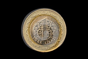 Turkish One Lira bimetallic Coin Isolated On Black