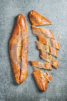 Turkish oriental pizza pide with cheese and spinach, grey background