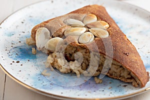 Turkish Perde Pilavi / Drape pilaf with chicken, almond and raisin