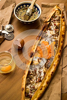 Turkish Pide with egg and minced meat.