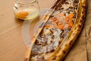 Turkish Pide with egg and minced meat.