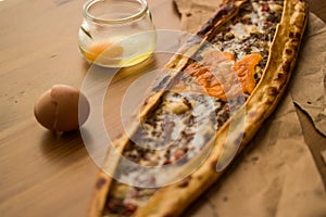 Turkish Pide with egg and minced meat.