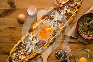 Turkish Pide with egg and minced meat.