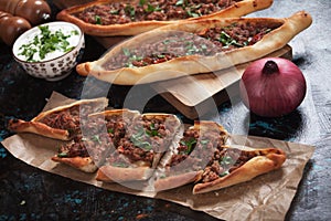 Turkish pide, traditional meal similar to pizza photo