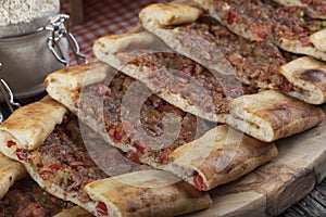 Turkish pide with minced meat, Kiymali Pide. Traditional Turkish cuisine. Turkish pizza Pita with meat. Top view photo