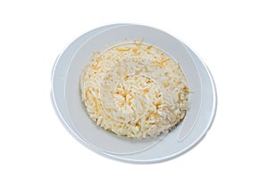 Turkish pilaff shaped with a bowl on a round white plate. sehriyeli pilav. Arpa sehiryeli pilav.