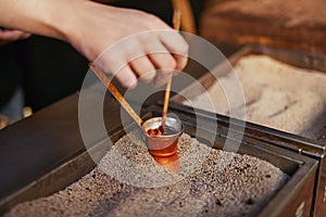 Turkish Coffee Preparing On Hot Sand