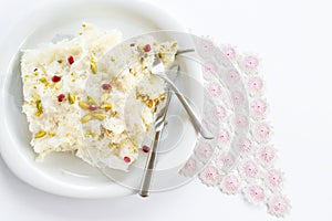 Turkish Ramadan Dessert Gullac portioned on plate.