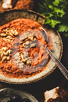 Turkish red pepper paste with walnuts, simit bagels and parsley