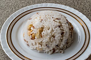 Turkish Rice with chickpea served with salt and pepper / Nohut Pilav. photo