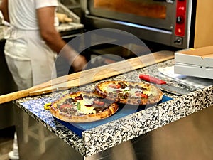 Turkish Round Pide Traditional food with beef and Salad.