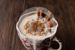 Turkish Salep with cinnamon sticks / Christmas Eggnog photo