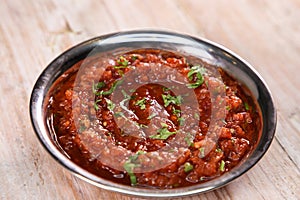 Turkish Salsa served in dish isolated on background top of arabic food cold mezza photo