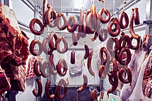 Turkish sausage and veal meat carcass in the cold storage room