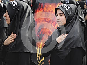 Turkish Shia girls takes part in an Ashura parade
