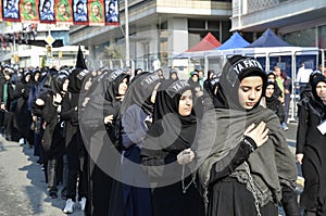 Turkish Shia girls takes part in an Ashura parade