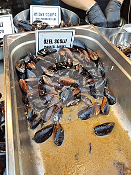 Turkish Stuffed Mussels with lemon / Midye Dolma. Mediterranean, rice