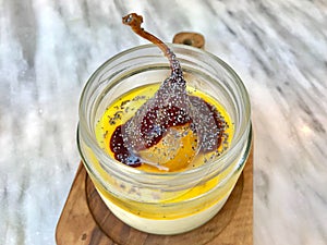 Turkish Style Custard Pudding Dessert with Safflower, Pear, Salep / Sahlep and Poppy Seeds in Jar