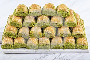 Turkish sweet Dry Baklava on a marble background. Turkish pastry dessert baklava. Ramadan or holiday desserts concept. Antep