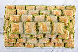 Turkish sweet Dry Baklava on a marble background. Turkish pastry dessert baklava. Ramadan or holiday desserts concept. Antep