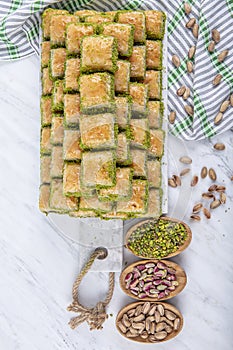 Turkish sweet Dry Baklava on a marble background. Turkish pastry dessert baklava. Ramadan or holiday desserts concept. Antep