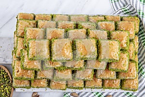 Turkish sweet Dry Baklava on a marble background. Turkish pastry dessert baklava. Ramadan or holiday desserts concept. Antep