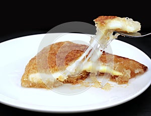 Turkish sweet kunefe. Kunafa Kadaif with cheese. photo