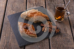 Turkish sweets baklava with tea nuts and cinnamon