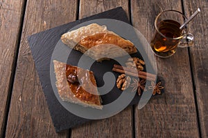 Turkish sweets baklava with tea nuts and cinnamon