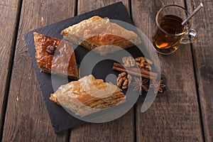 Turkish sweets baklava with tea nuts and cinnamon