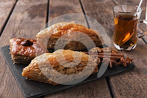 Turkish sweets baklava with tea nuts and cinnamon