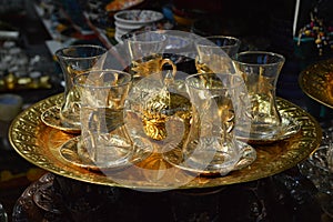 Turkish teapots set, glass teapots with golden detail for sale in market photo