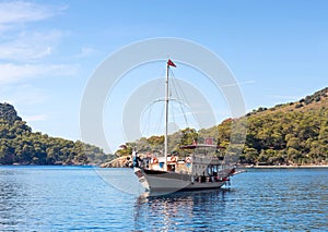 Turkish touristic boats over calm sea in Olu Deniz, Turkey
