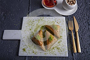 Turkish traditional Baklava dessert and tea concept. Food pastry background photo