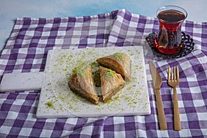 Turkish traditional Baklava dessert and tea concept. Food pastry background photo