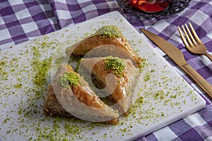 Turkish traditional Baklava dessert and tea concept. Food pastry background photo