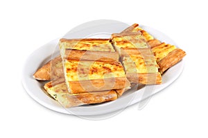 Turkish traditional closed Bafra pide with cheese. Kapali peynirli pide. Isolated on white background photo