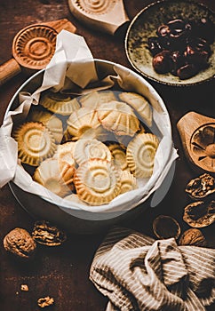 Turkish traditional Hatay semolina cookies with walnut filling and figs photo